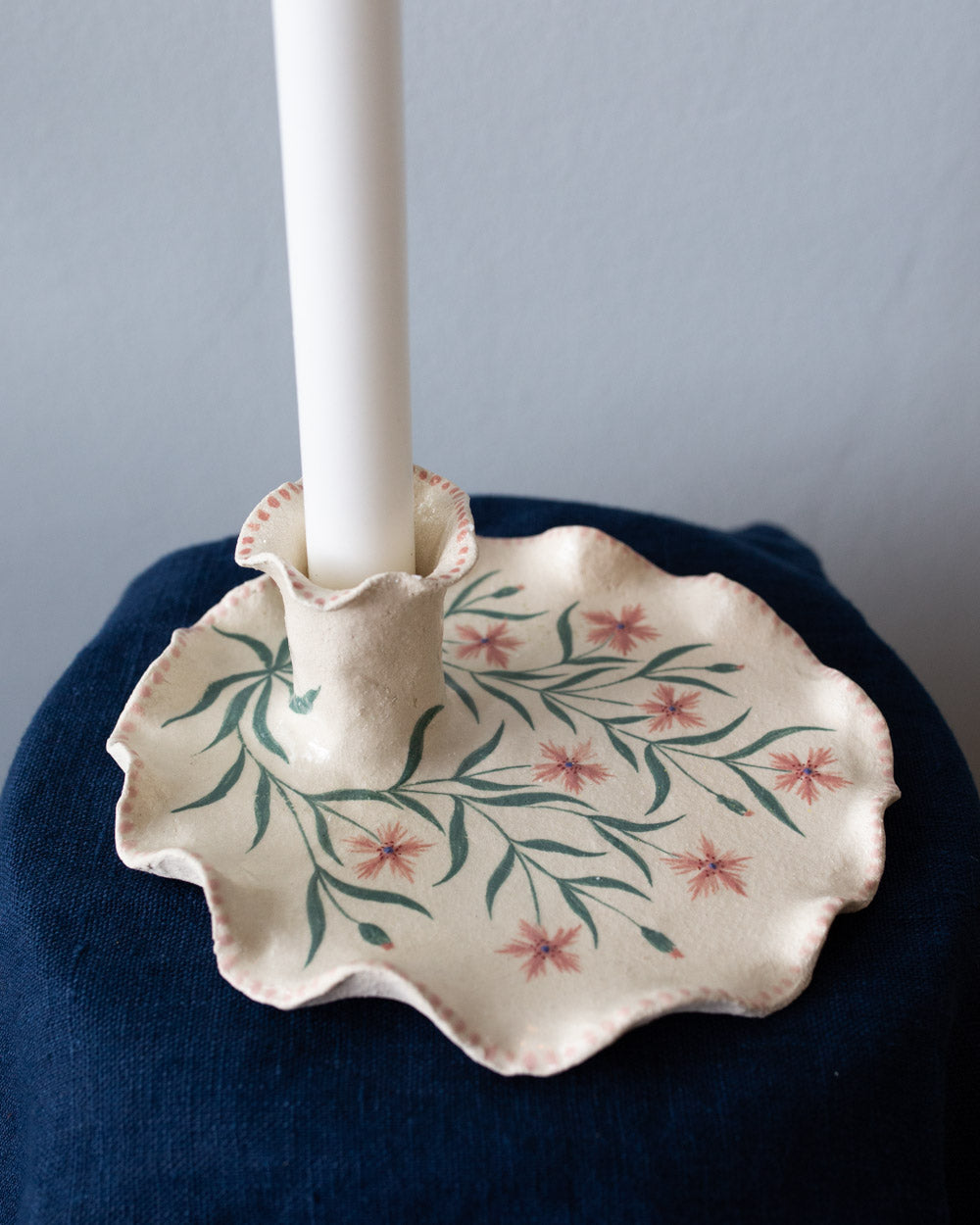Maiden, Candle holder