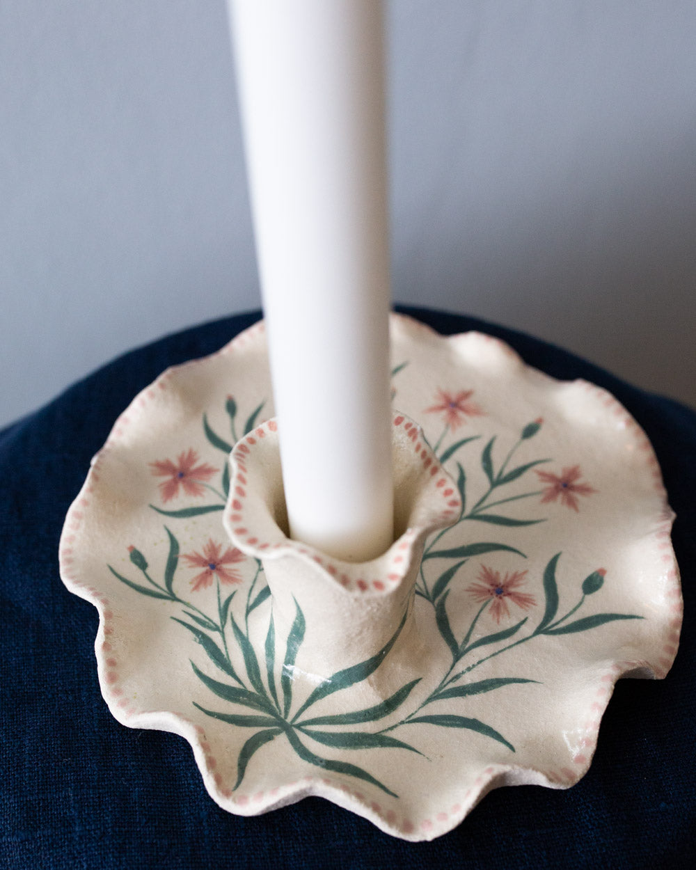 Maiden, Candle holder